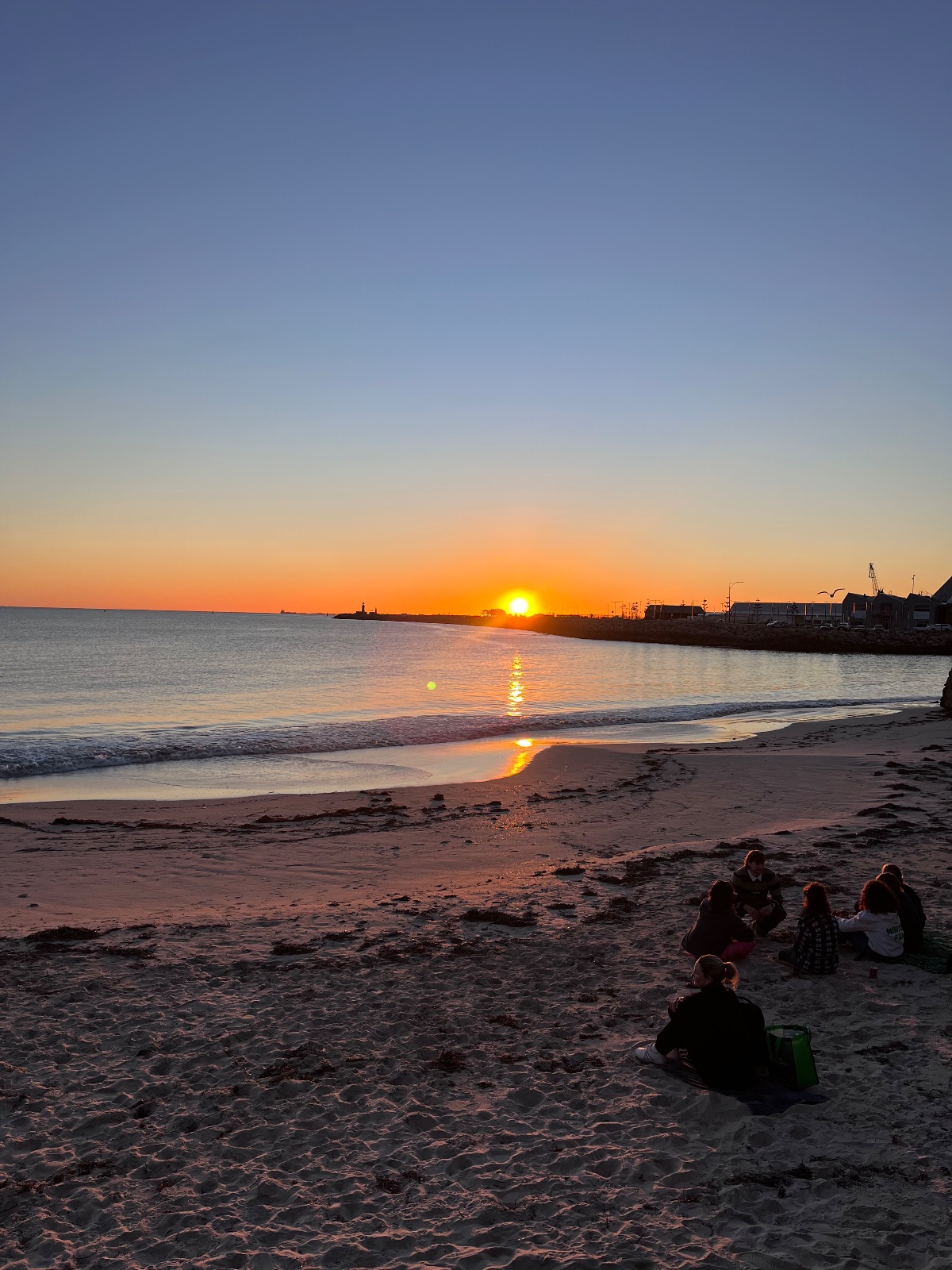 Watching the sunset at the beach.
